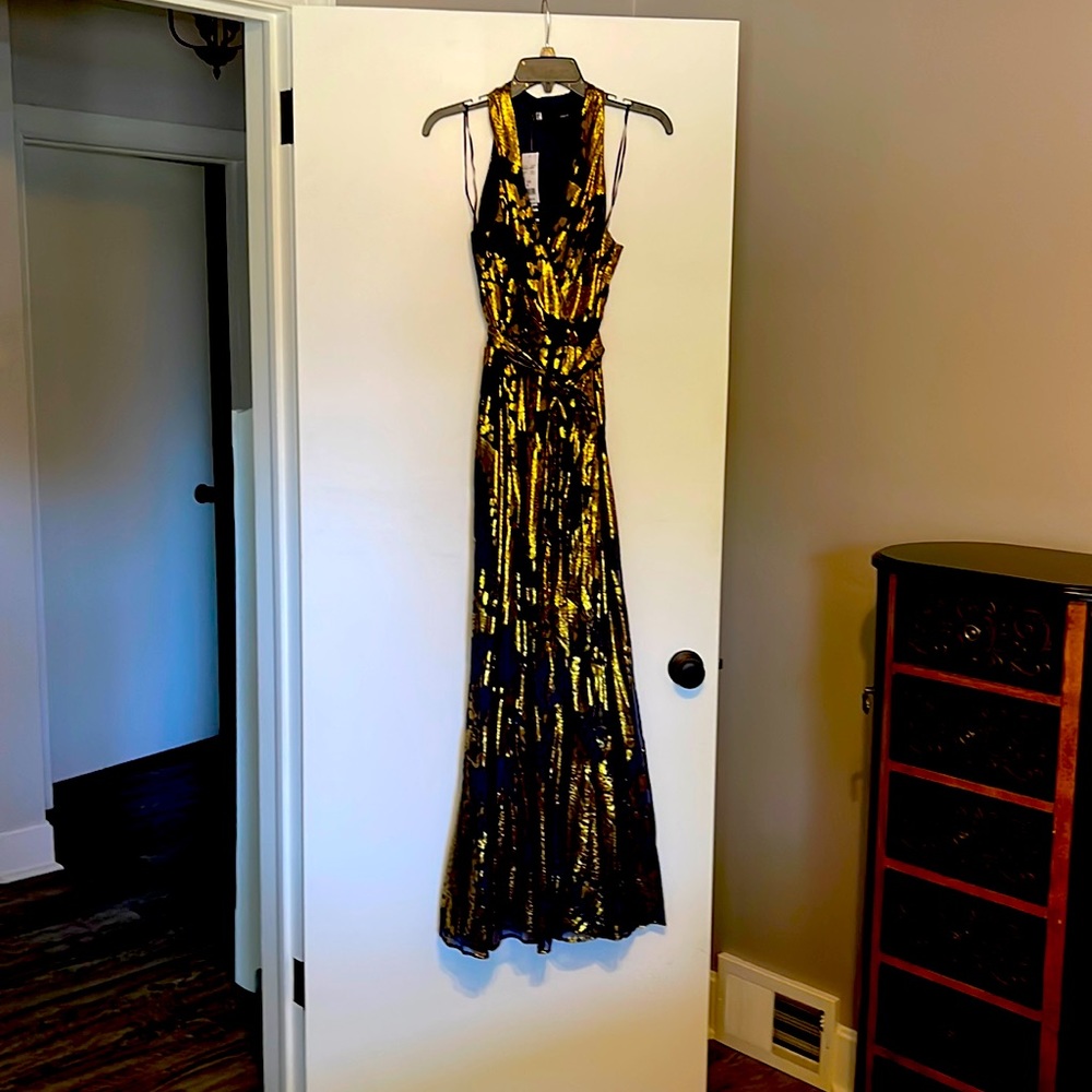 Nwt gorgeous deep bluish purple gold long sleeveless dress. Very comfortable